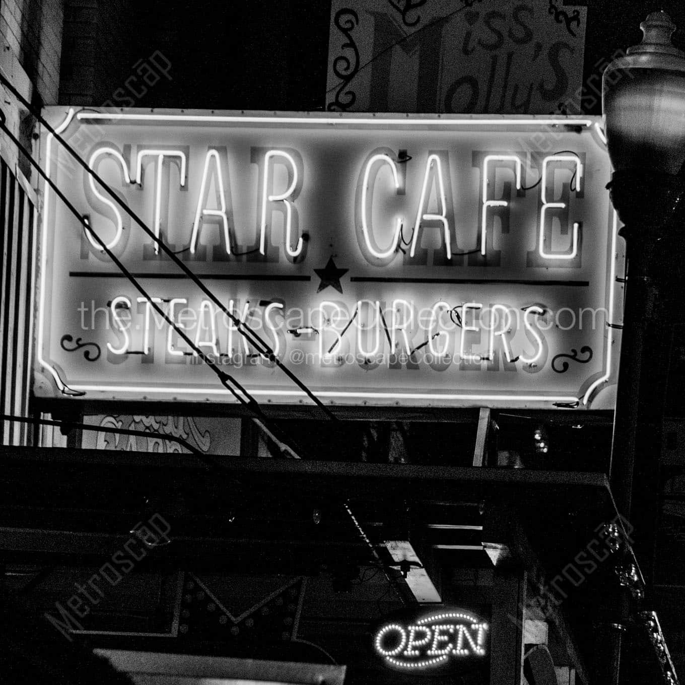 star cafe at night Black & White Wall Art