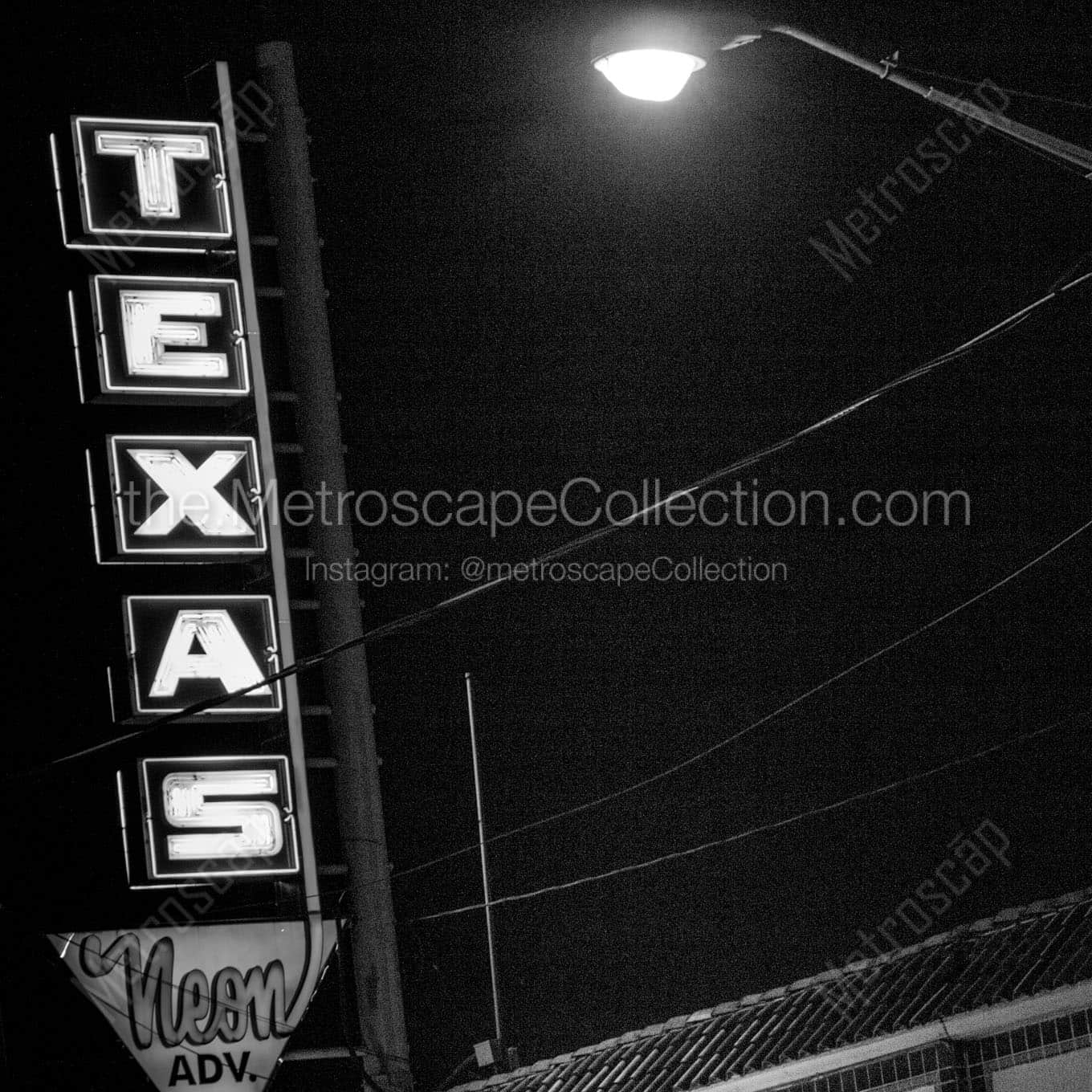 texas neon advertising sign Black & White Wall Art